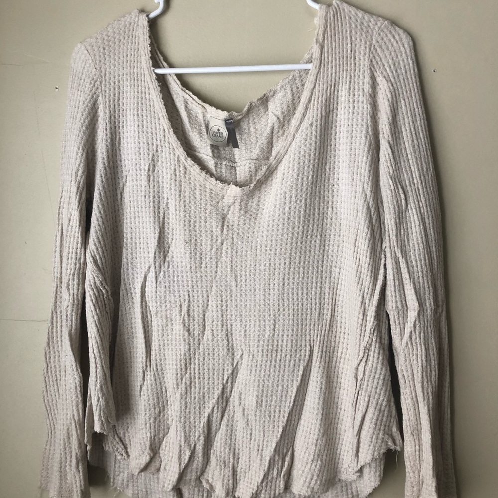 Cream waffle textured shirt.